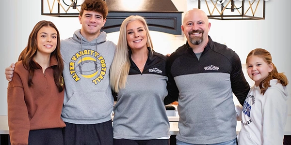 A photo of the Gulick family, owners of Revolution Barn and Garage.